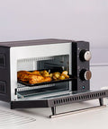 Bild-8-dcg-elektrischer-Ofen-mit-Timer-10l-650w-schwarz-EAN-8052780965552
