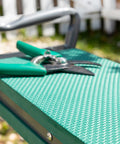 bild-8-innovagoods-klappbare-gartenbank-mit-tasche-für-gartenwerkzeuge-60x49x275cm-ean-8435527821616