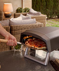 Bild-8-reber-gasbetriebener-pizzaofen-mit-drehteller-tasche-und-rolle-4000w-64x44x315cm-ean-8013152700034