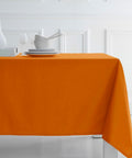 bild-3-i-casamici-set-100-tovaglie-tnt-monosuo-arancio-140x140cm-ean-8056304644152
